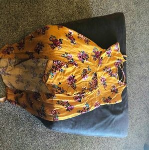 Yellow romper with long train in back